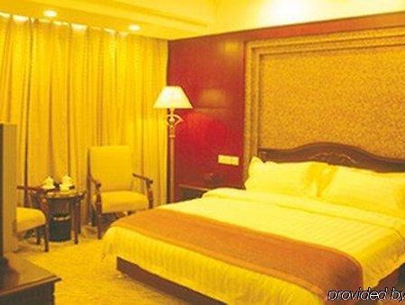 Tian Cheng Grand Hotel ريتشاو الغرفة الصورة