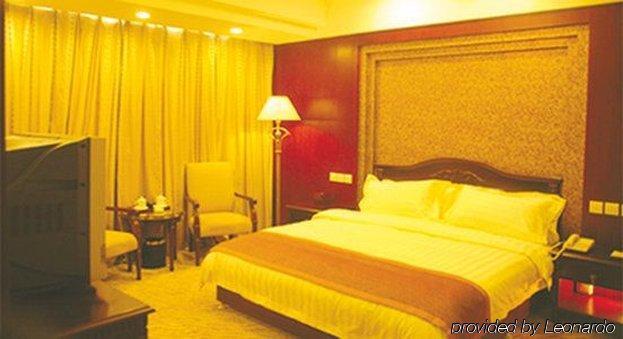Tian Cheng Grand Hotel ريتشاو الغرفة الصورة