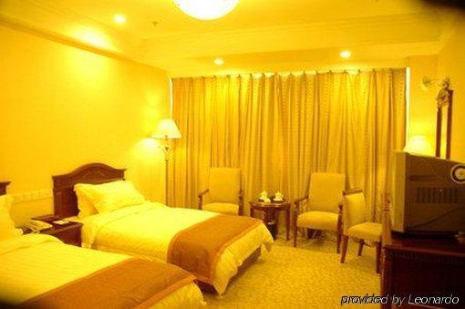 Tian Cheng Grand Hotel ريتشاو الغرفة الصورة
